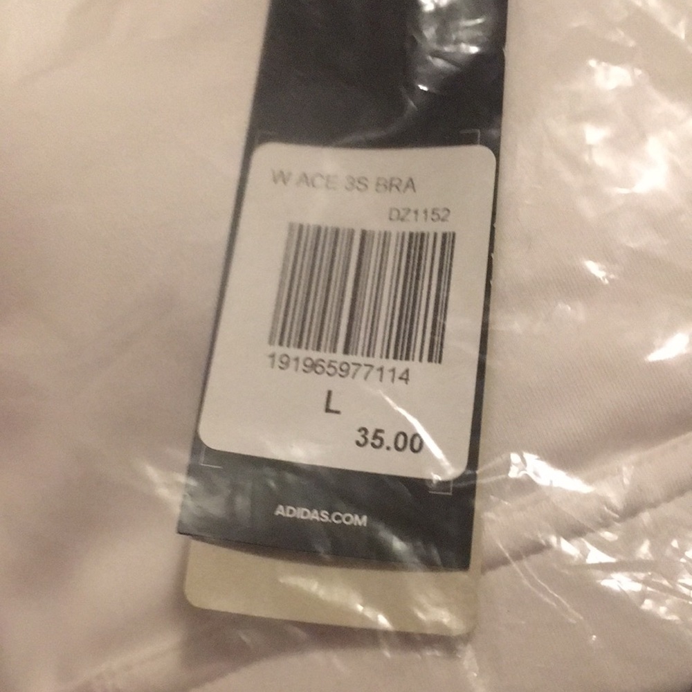 Adidas large girls white sports bra. This has never been opened. New with tags - Picture 3 of 4